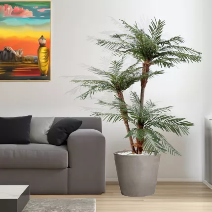 PALMIER artificiel 3 TRONCS NEW TF 160 à 200 cm dans un salon