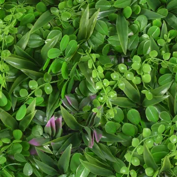 Feuillage artificiel sur mur ignifugé