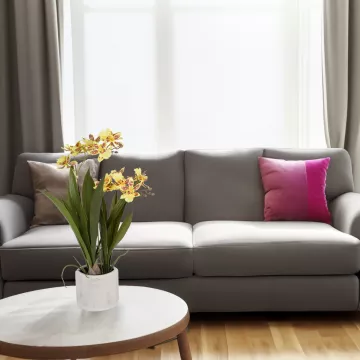 ORCHIDEE artificielle oncidium jaune en pot 47 cm - sur table basse d'un salon