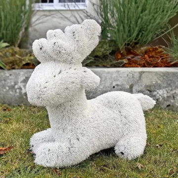 RENNE BLANC synthétique 45 cm dans la pelouse