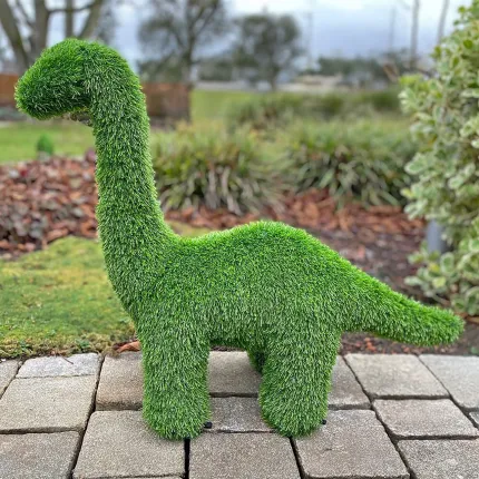 Dinosaure synthétique 65 cm - dans une allée