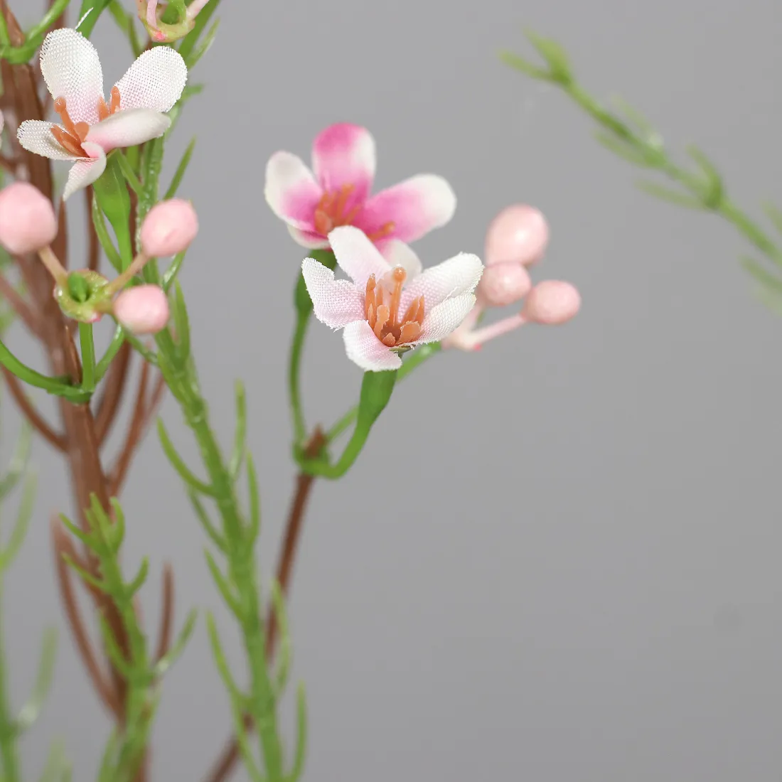 Fausse fleur de cire rose - détail des fleurs
